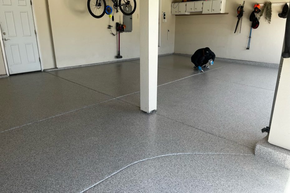 Light gray flake garage floor with bikes hung on the wall